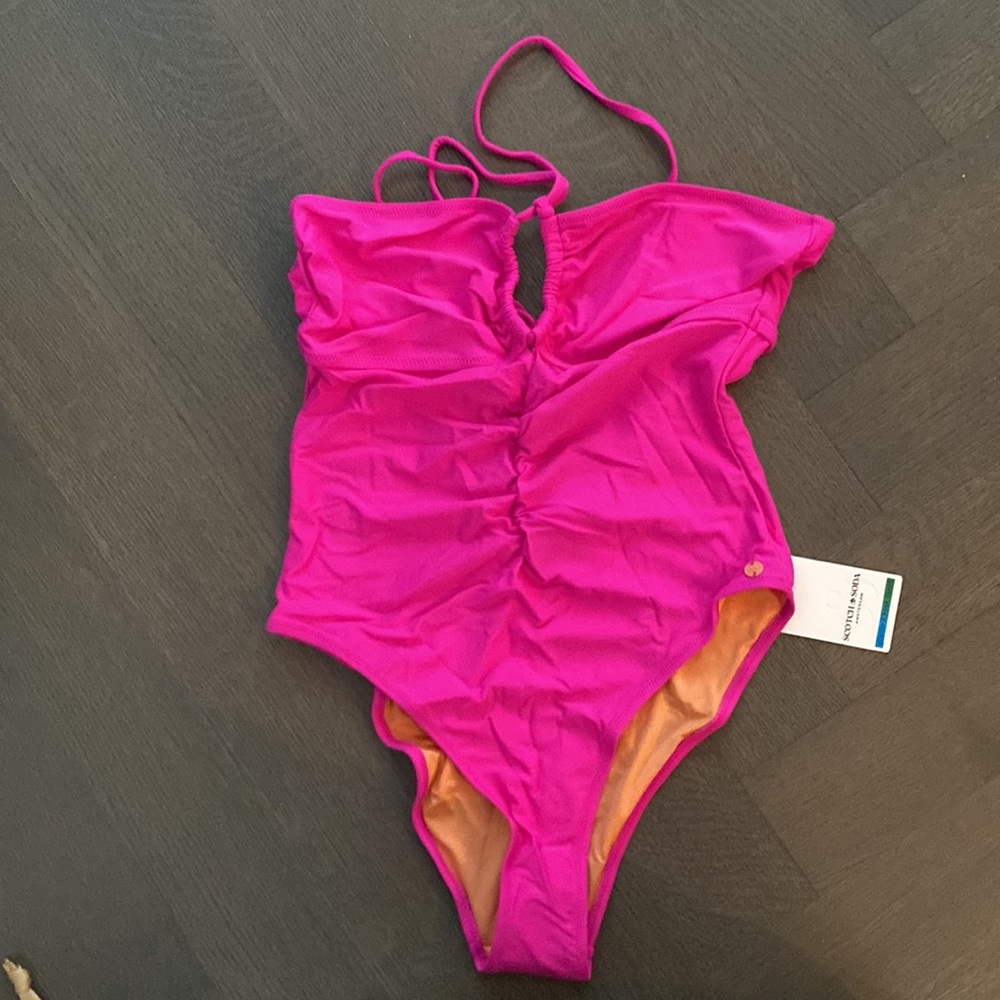Scotch & soda pink one piece bathing suit.